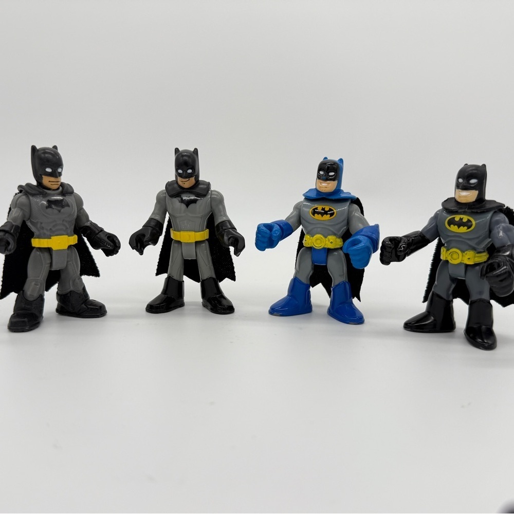 Imaginext DC Super Friends Batman Figures Set of 4 Classic, Grey & Blue Variants